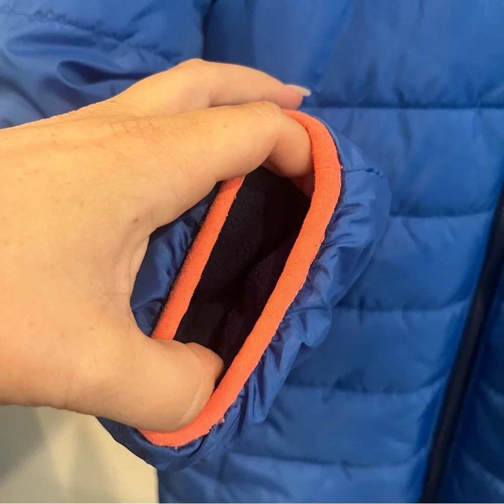 Under Armour kids size X-Large blue and orange reversible puffer jacket hooded